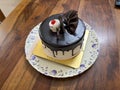 close-up of a chocolate cake served in an white plate Royalty Free Stock Photo