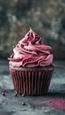 Close-up of a chocolate cupcake with pink frosting Royalty Free Stock Photo