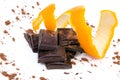 Close-up of chocolate pieces with orange Royalty Free Stock Photo