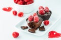 Close up of chocolate raspberry mousse filled cups for Valentines Day.