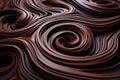 a close up of chocolate swirls on a black background