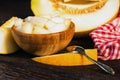 Chopped melon in a wooden bowl close Royalty Free Stock Photo