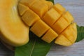 close up of chopped mango fruit.