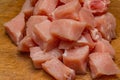 Close up of chopped up pork tenderloin steak isolate on a wooden chopping board Royalty Free Stock Photo