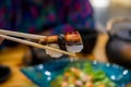 Close up chopsticks hold on sushi freshwater eel grilled. Japanese food for healthy. unagi sushi, premium sushi menu. Royalty Free Stock Photo