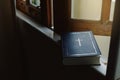 Close up christian holy Bible Placed by the window