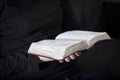 Woman sits and read the Bible Royalty Free Stock Photo