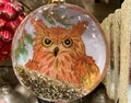 Close up of christmas ball with owl in the xmas tree Royalty Free Stock Photo