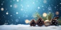 close up on Christmas decor adornments, pinecones, branches and spheres on a snow surface, blue background with snowflakes out of Royalty Free Stock Photo