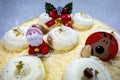 Close-up of Christmas decorations on top of a frosted cake