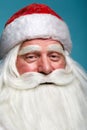 Close-up christmas face portrait of russiad Santa Claus Ded Moroz looking ironically at the camera Royalty Free Stock Photo