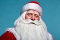 Close-up christmas face portrait of russiad Santa Claus Ded Moroz looking ironically at the camera Royalty Free Stock Photo