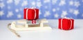 Close-up. Christmas gift boxes on santa claus sleigh, on blue background Royalty Free Stock Photo