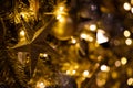Close up of Christmas golden decoration with sparkles and lighjts Royalty Free Stock Photo