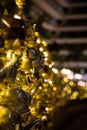 Close up of Christmas golden decoration with sparkles and lighjts Royalty Free Stock Photo