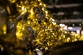 Close up of Christmas golden decoration with sparkles and lighjts Royalty Free Stock Photo