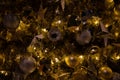 Close up of Christmas golden decoration with sparkles and lighjts Royalty Free Stock Photo