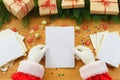 Close-up of Christmas letter in Santa Claus hands Royalty Free Stock Photo