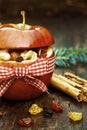 Close up Christmas Spices in Hollowed Red Apple Royalty Free Stock Photo
