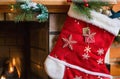 A close-up of a Christmas stocking hung by the fireplace, with a name tag on it, Generated AI Royalty Free Stock Photo