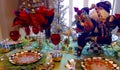 Close up of Christmas table setting with Santa Claus figurine