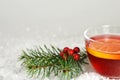 Christmas tea with lemon slice in transparent cup Royalty Free Stock Photo