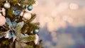 Close-up of Christmas tree decorated with Christmas bauble and bokeh background, vintage tone horizontal view. Royalty Free Stock Photo