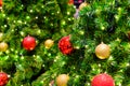 Close up of Christmas tree decorated with red and gold ball with boken Royalty Free Stock Photo