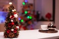 Close up of christmas tree in festive kitchen organized for winter