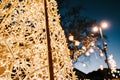 A close-up of a Christmas tree in a park made of many small LED lamps against a twilight sky. Large Christmas tree Royalty Free Stock Photo