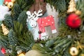 Close Up of a Christmas Wreath With Reindeer Ornament Royalty Free Stock Photo