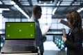 Close up of chroma key notebook used by teamworking server room IT experts