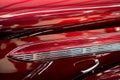Close Up Of Chrome Decoration On Metallic Red Classic Car Royalty Free Stock Photo
