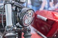 Close-up on chrome headlights of luxury Motorcycle. Chromed headlamp of a motorcycle, stylish classic chrome-plated motorcycle Royalty Free Stock Photo