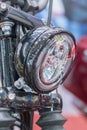 Close-up on chrome headlights of luxury Motorcycle. Chromed headlamp of a motorcycle, stylish classic chrome-plated motorcycle Royalty Free Stock Photo