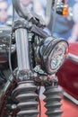 Close-up on chrome headlights of luxury Motorcycle. Chromed headlamp of a motorcycle, stylish classic chrome-plated motorcycle Royalty Free Stock Photo