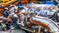 Close-Up Chrome Turbocharger and Exhaust Manifold of a Customized, High-Performance Car Engine. Royalty Free Stock Photo