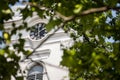 Close up on Church clocktower steeple of the serbian orthodox church of Alibunar, Voivodina, Serbia with its iconic clock