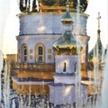 Close-up of church with golden domes and cross in sunshine, view from window