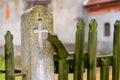 Close-up of the church\'s forgotten, dilapidated wooden fence