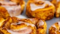 Close up of cinnamon bun with with frosting glaze Royalty Free Stock Photo