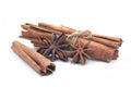 Close-up of Cinnamon sticks heap and star anise spice isolated on  white Royalty Free Stock Photo