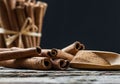 Close up cinnamon sticks and cinnamon powder in wooden spoon  on wooden table background Royalty Free Stock Photo