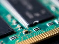 Close-up of circuit board with integrated circuits, resistors and capacitors Royalty Free Stock Photo