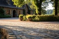 close up of circular stonework paving on a french country house driveway
