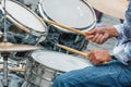 Close-up of city drummer during a day