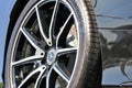 Close up of a CLA coupe mercedes wheel with alloy wheels and Continenal tire.