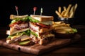 Close-up of a Classic Club Sandwich with Grilled Chicken, Ham, Bacon, Lettuce, and Tomato, Served with Pickle Royalty Free Stock Photo