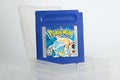 Close-up of classic Nintendo Gameboy game cartridge, Pokemon Blue version with Blastoise character