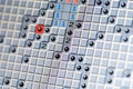Close-up of the classic traditional Minesweeper game interface on an old low res display screen, grid and mines, retro Windows XP